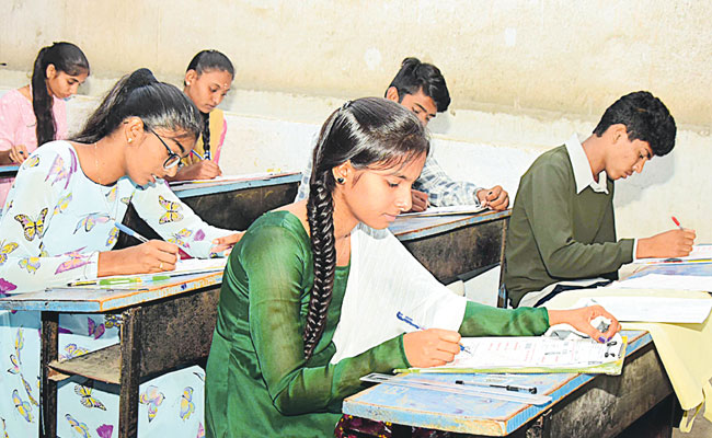 Students writing inspire test